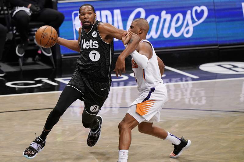 Durant scores 33 points in return, Nets beat Suns 128-119