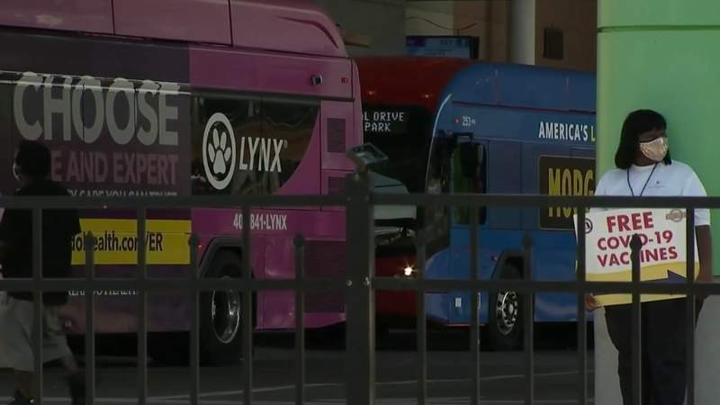 Lynx bus riders get vaccinated at Central Station in Downtown Orlando