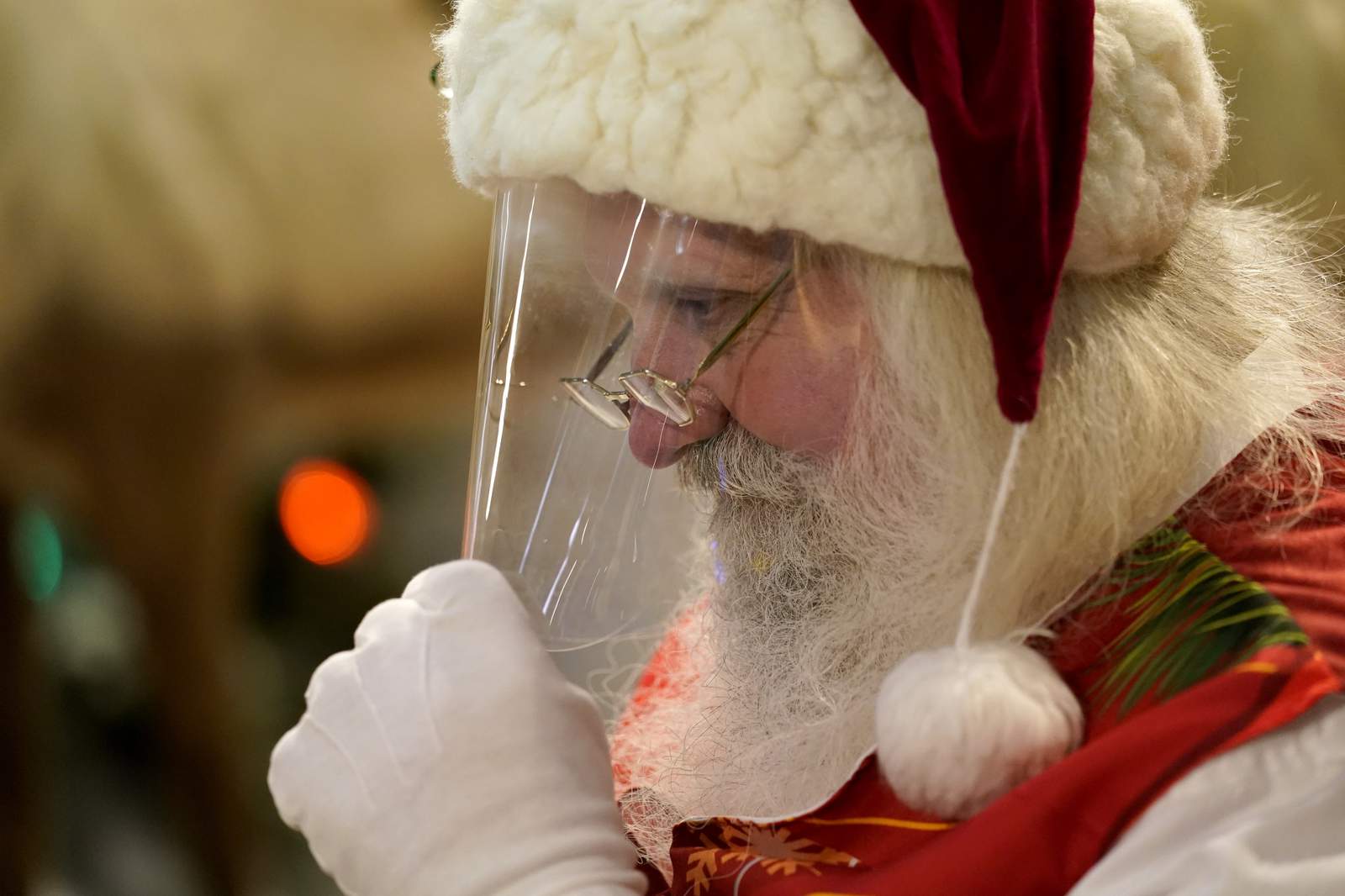 Ho, ho — Whoa! Coronavirus keeping most Santas at a distance