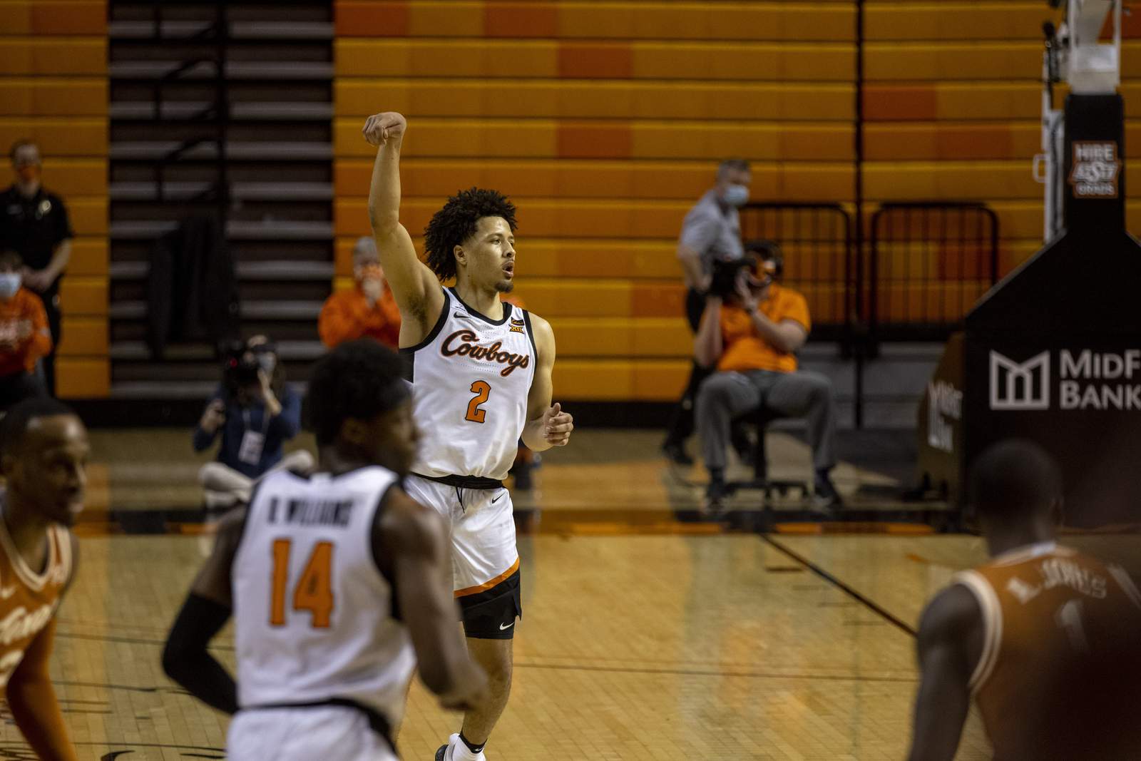 Cunningham helps Oklahoma St beat No. 6 Texas in double OT