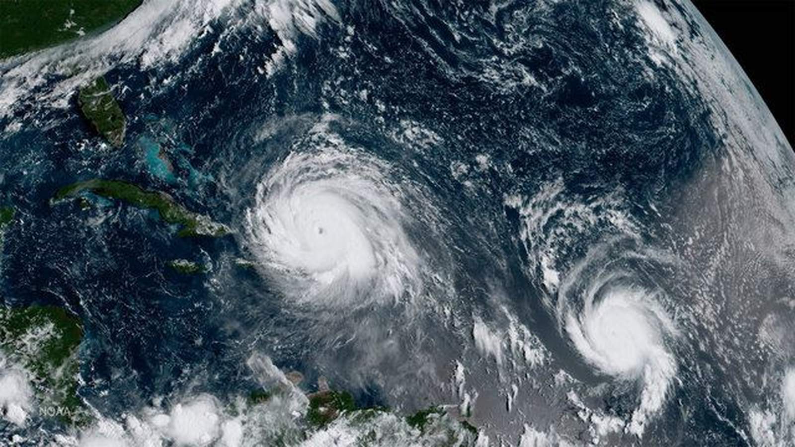 What's the process behind naming tropical storms and hurricanes?
