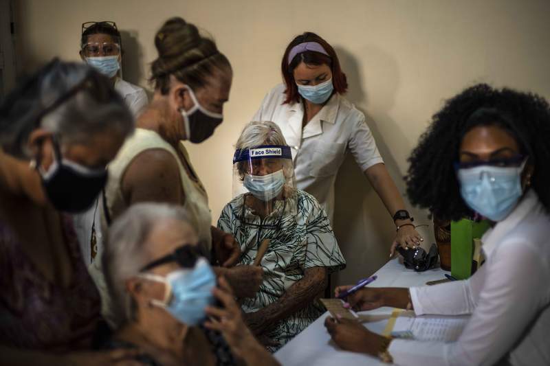 Virus slams Cuba as it races to roll out its new vaccines