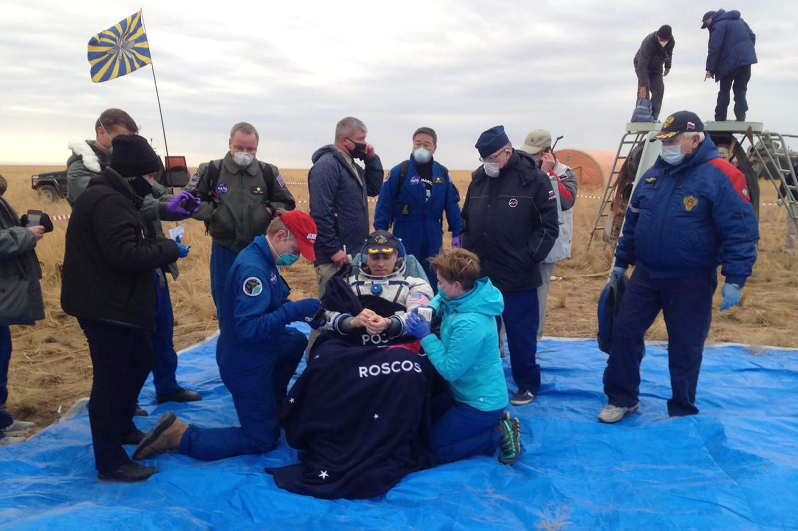 Trio who lived on space station return to Earth safely