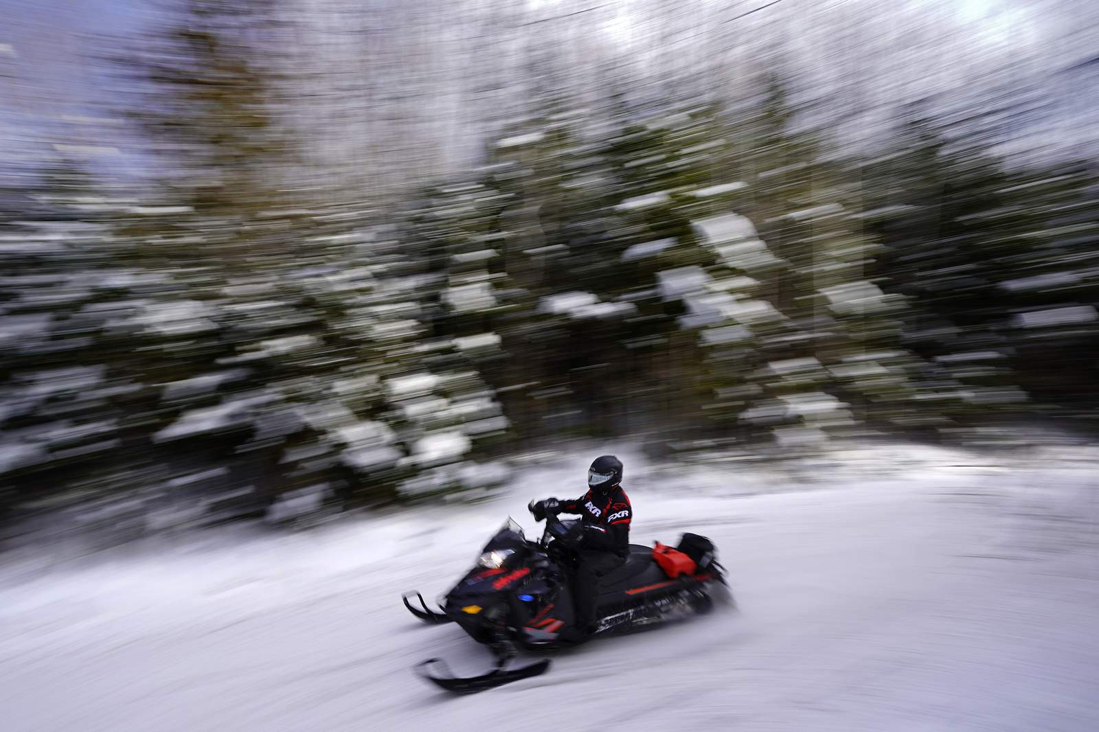 Masks, social distancing and speed: Snowmobiles enjoy boom