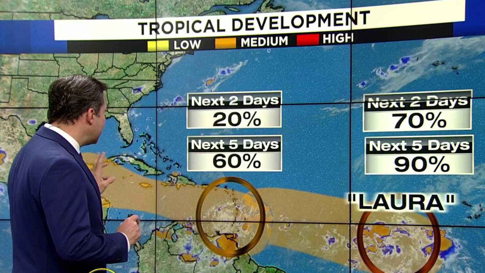 Laura, is that you? 2 systems continue to swirl in the tropics. Heres the latest
