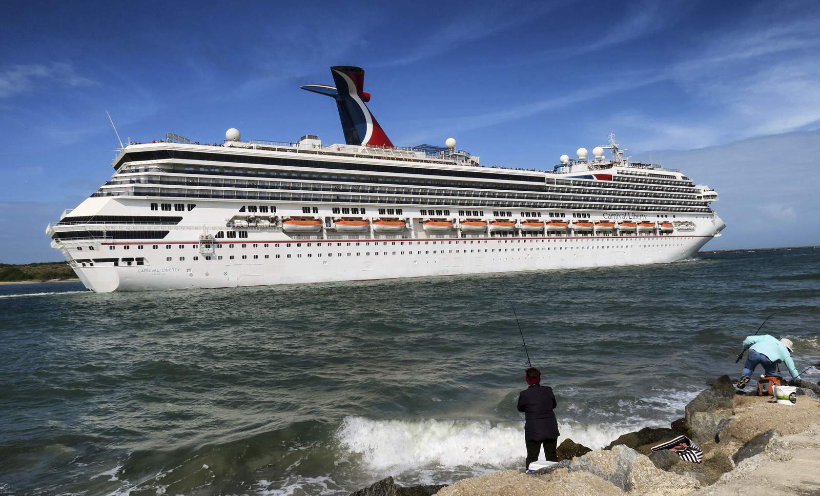Carnival announces layoffs and furloughs as cruise industry works to stay afloat