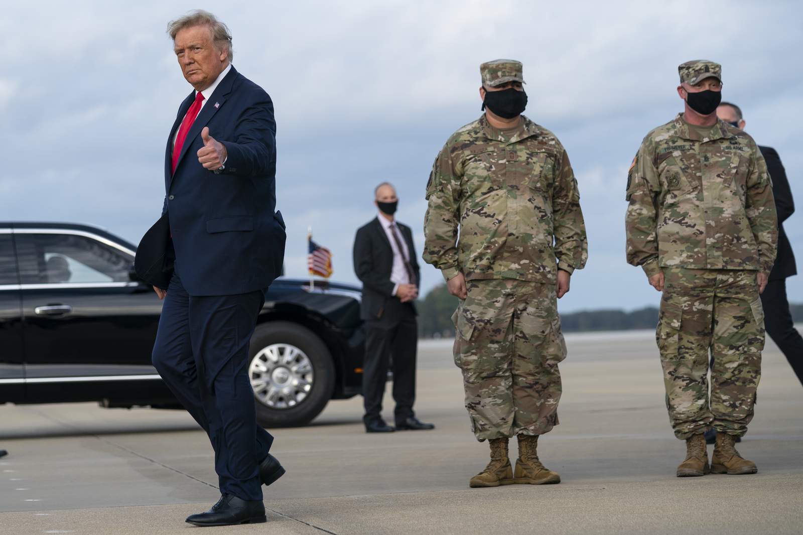 The Latest: Trump meets troops involved in al-Baghdadi raid