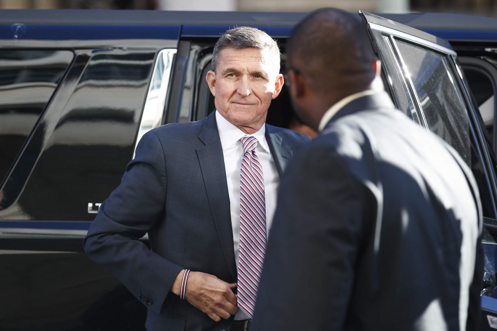 Judge dismisses Flynn case following pardon from Trump