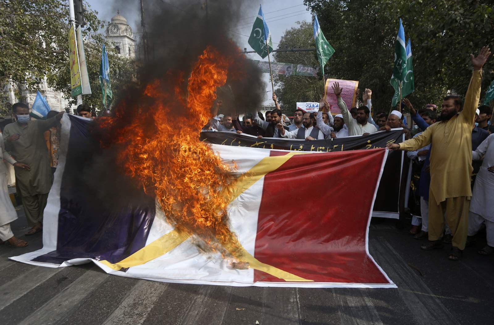 As anger rises, Muslims protest French cartoons