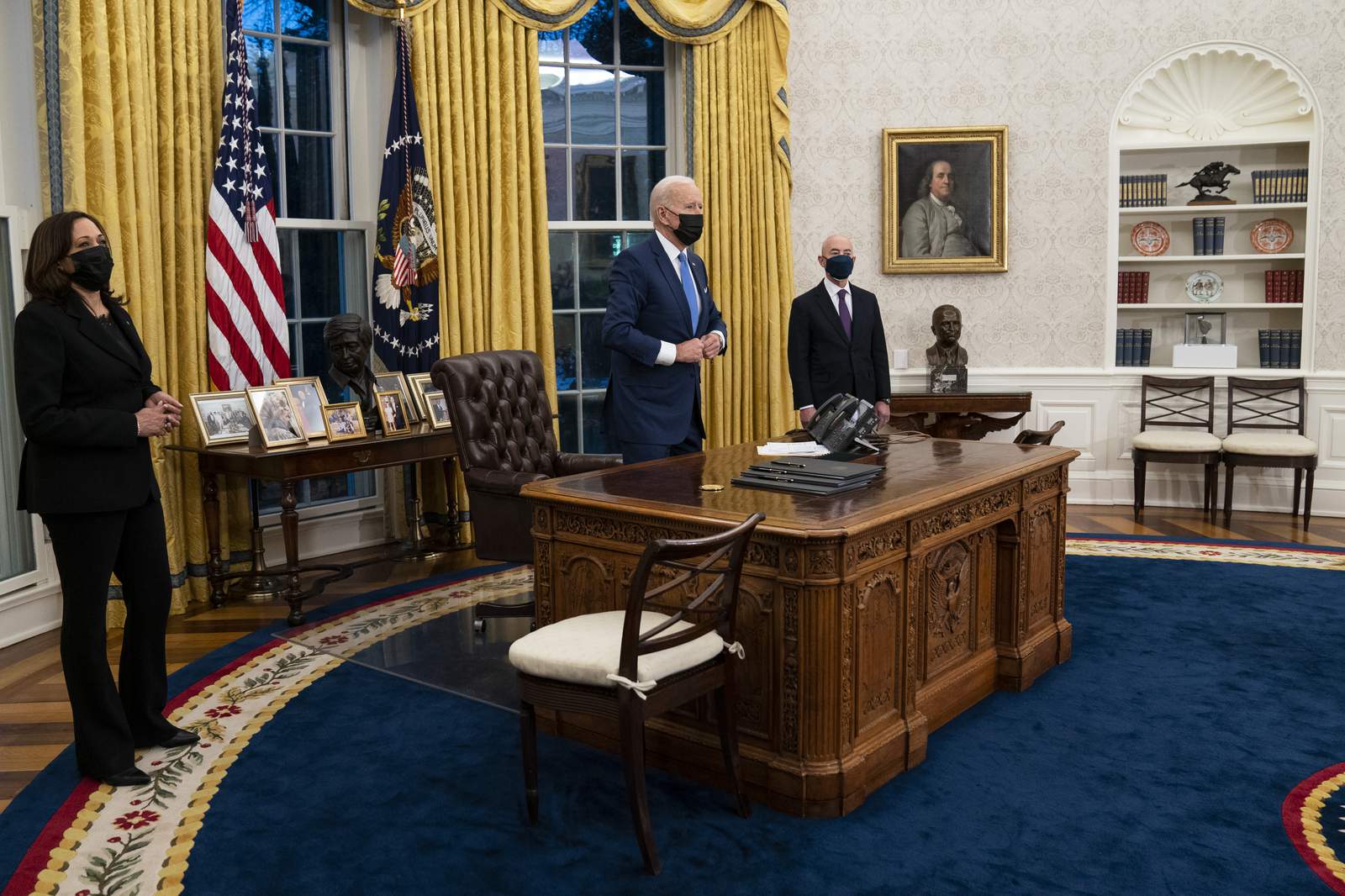 AP-NORC Poll: Americans open to Biden's approach to crises