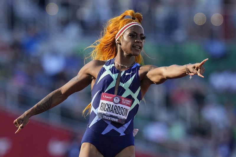 The Latest: Allman wins discus, earns spot at Tokyo Games