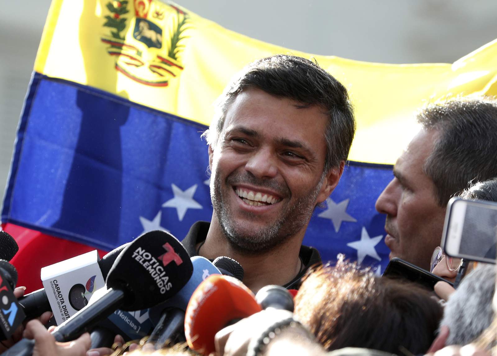 Opposition activist leaves embassy haven to flee Venezuela