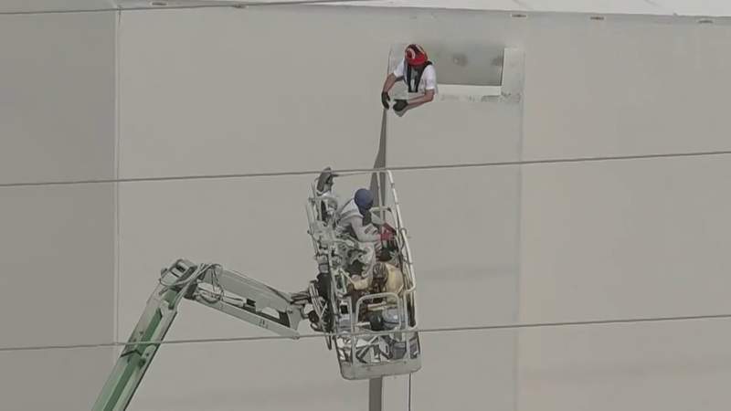 Construction workers back on the ground after high-angle rescue