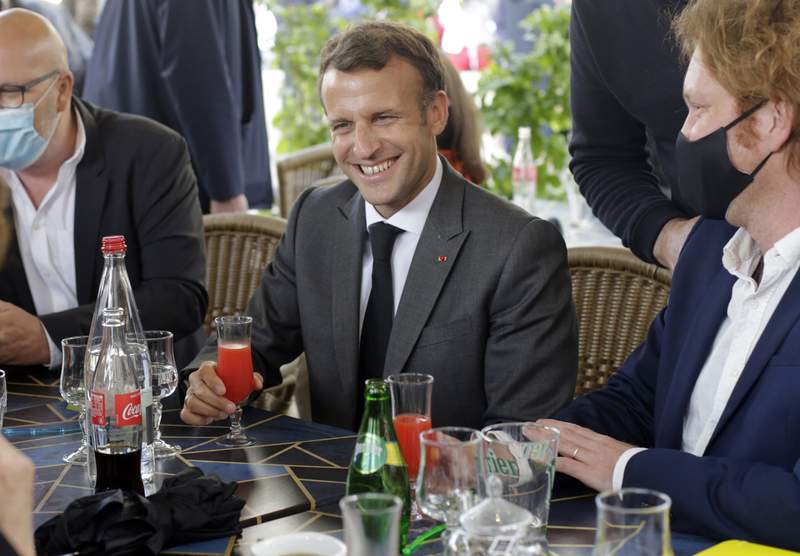 With tall Trump tale, Macron plays to France's young voters