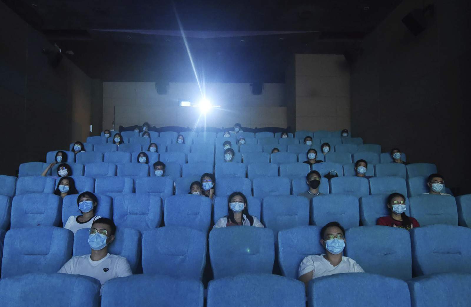 Some Chinese cities reopen cinemas as virus threat recedes