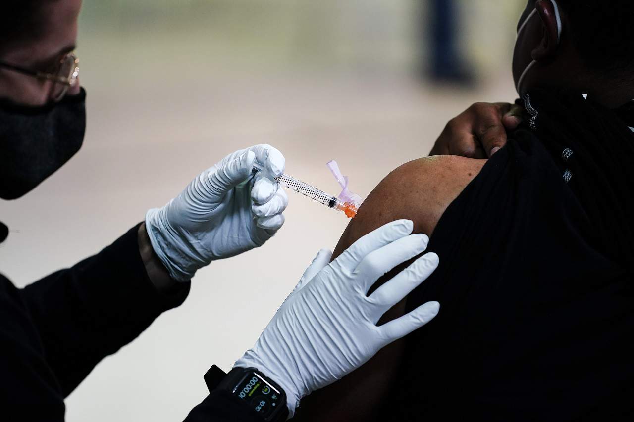 Florida reports 5,869 new COVID-19 cases as governor bans vaccine passports