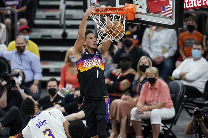 Suns win in return to playoffs, beating Lakers 99-90