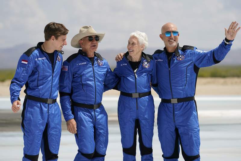 Jeff Bezos reaches space on Blue Origin’s first passenger flight, returns to Earth