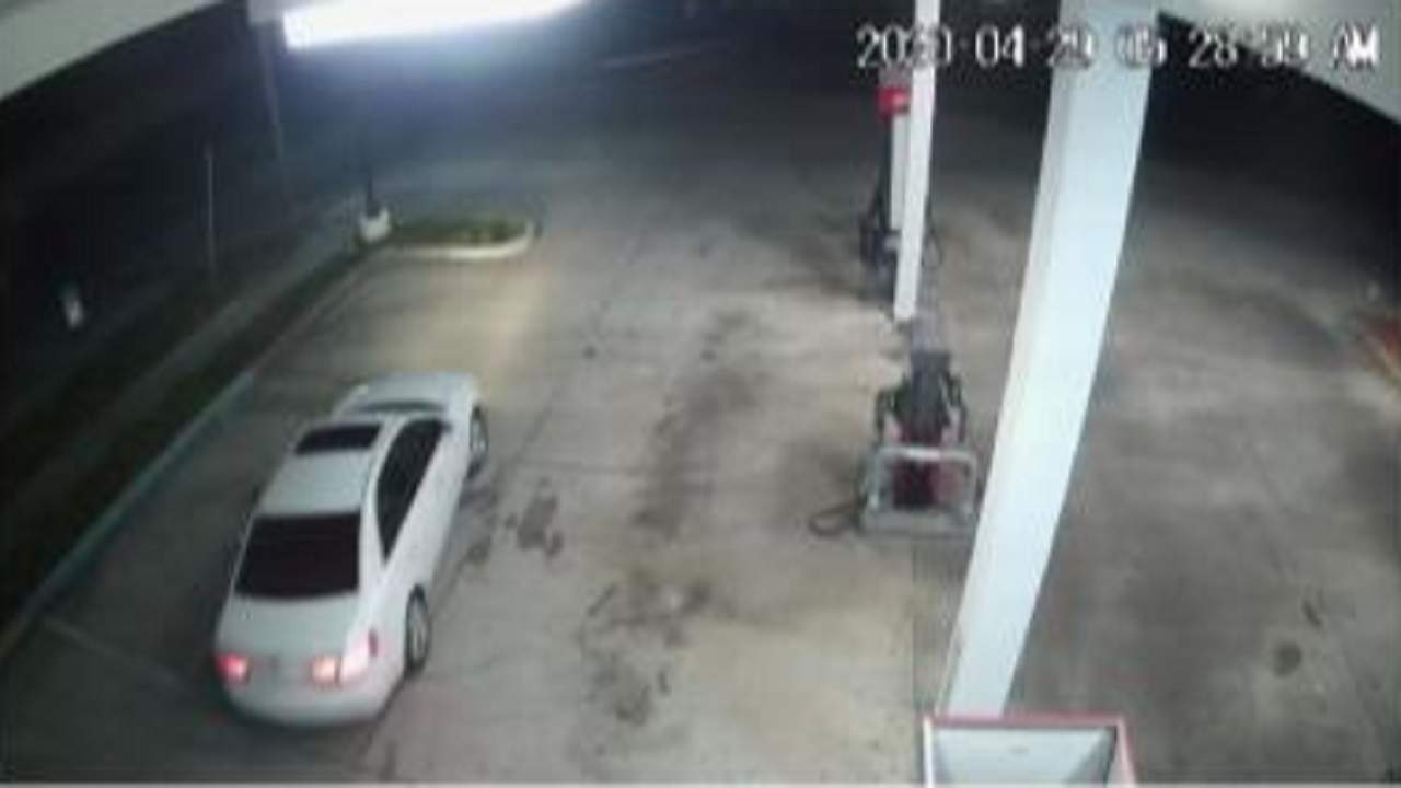 Orlando police say two men wanted in connection with a gas station shooting fled in this white car.