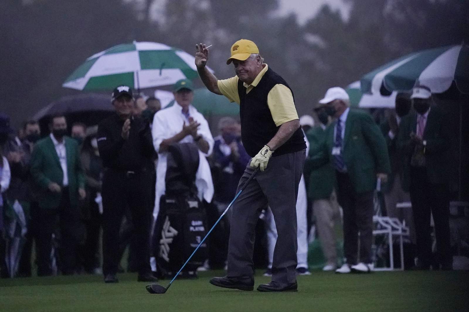 Honorary starters, then rain, as 1st fall Masters begins