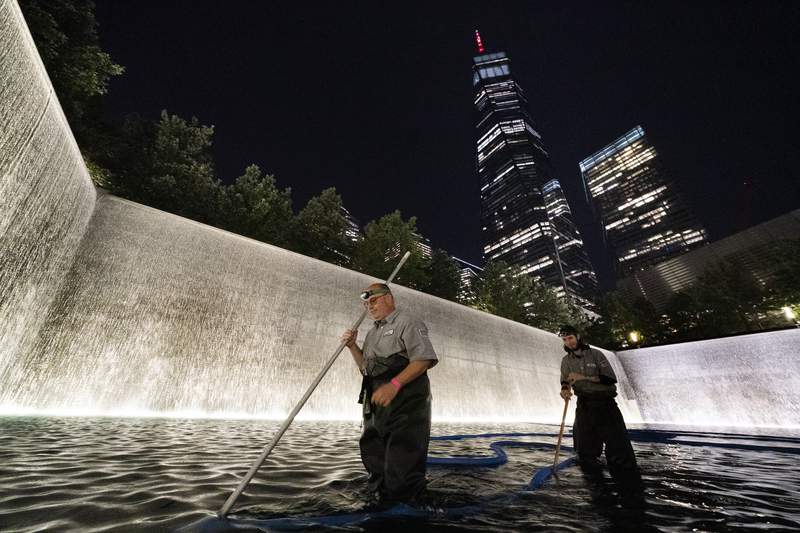 Ground zero: A selfie stop for some, a cemetery for others
