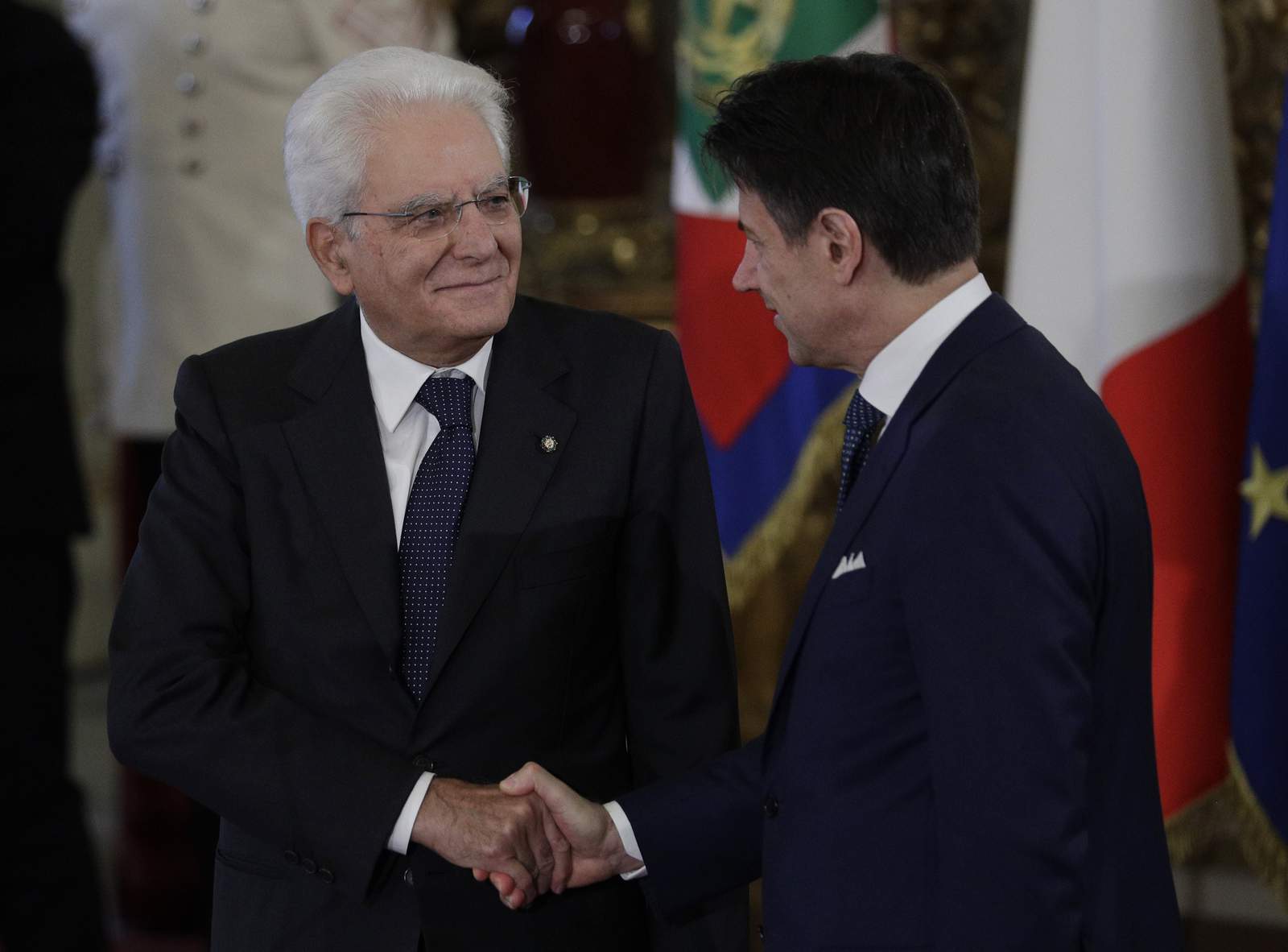 Italian premier resigns, setting off scramble for new allies