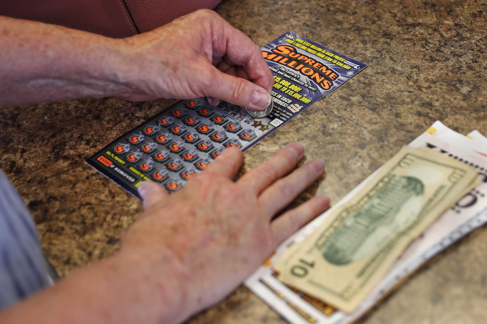 Man wins $2M lottery after clerk gives him wrong ticket