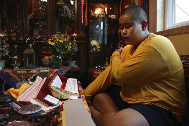 For US teen Buddhist lama, it’s faith, school, football