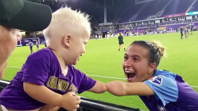 Soccer star, toddler share bond
