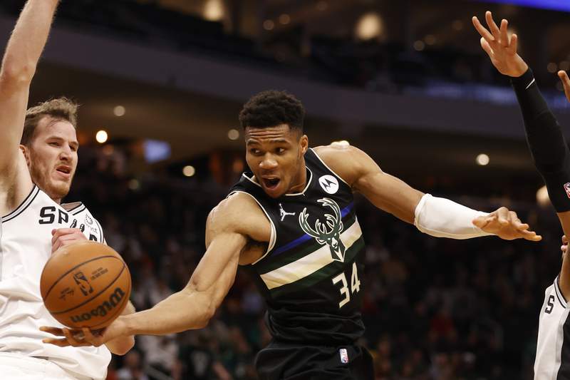 Injuries cause reigning champion Bucks to struggle early