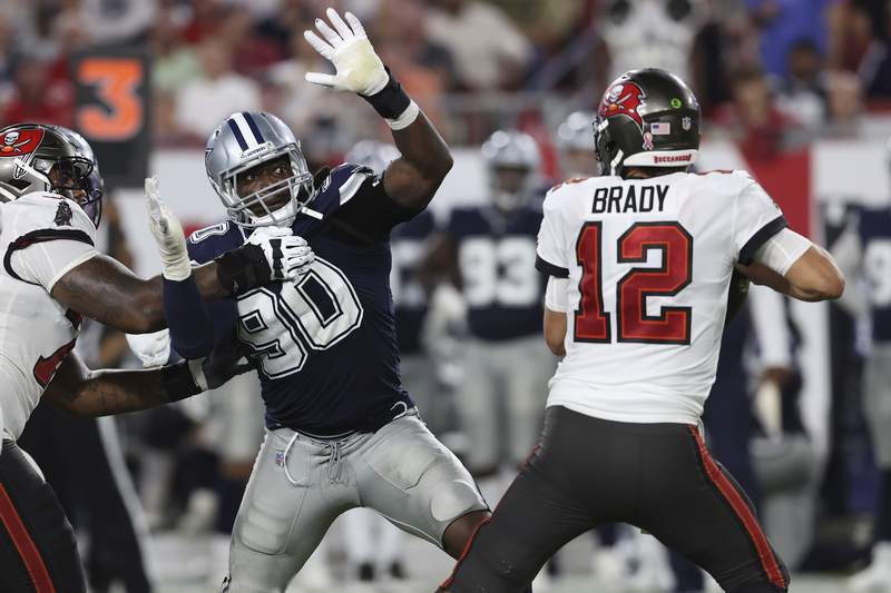 Tom Brady throws for 379 yards, 4 TDs as Bucs beat Cowboys in NFL opener