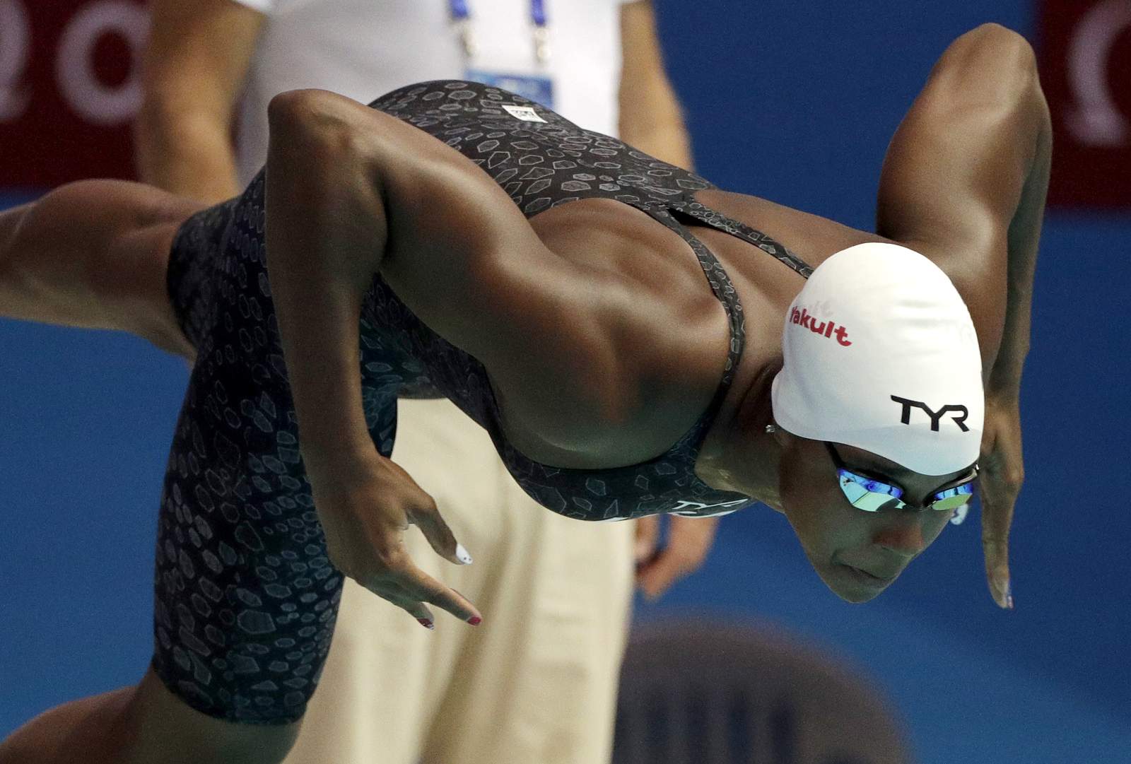 Simone says: Olympic champ pushes for change in, out of pool