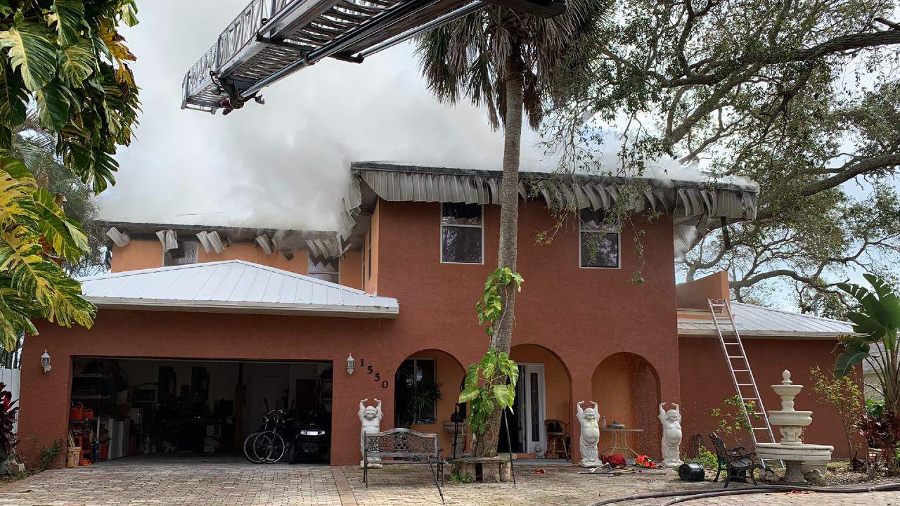 Residents helped out of Merritt Island home after attic fire