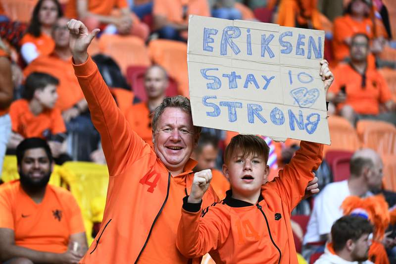 The Latest: Fans in Amsterdam show support for Eriksen