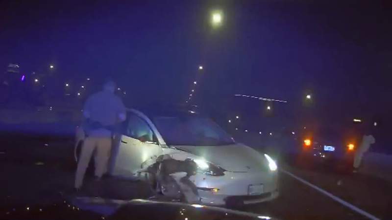 New video shows Tesla almost hitting state trooper as it slams into disabled vehicle on I-4