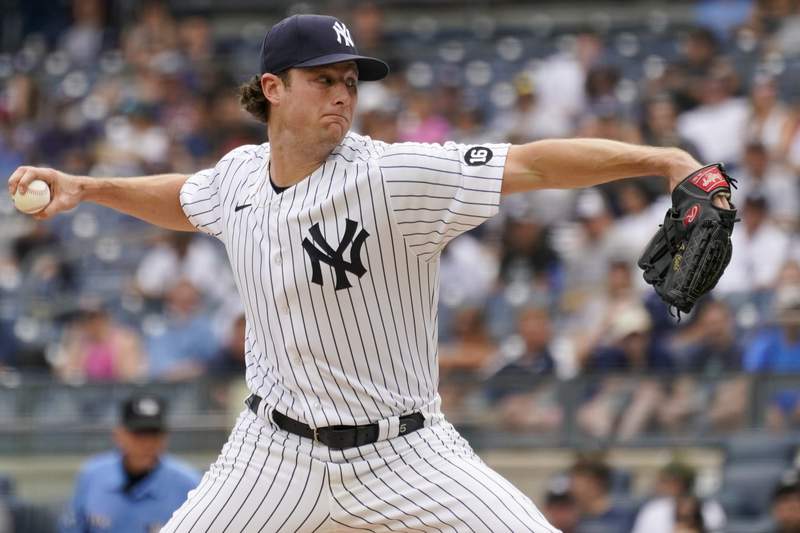 Cole pitches streaking Yanks past Twins; Sunday's game PPD