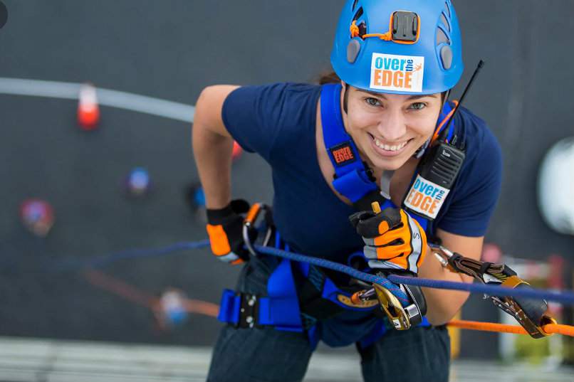 Don’t look down: Brave participants rappel 428 feet to raise money for Give Kids the World