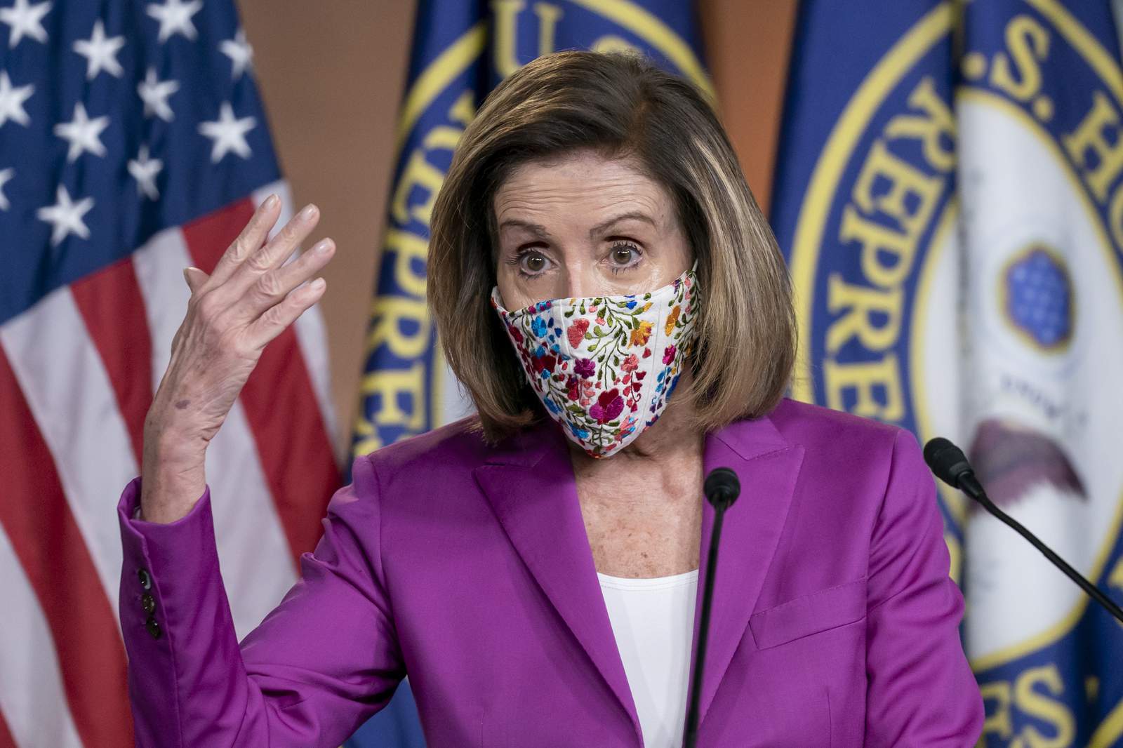 The Latest: Pelosi ties rioters' actions to 'whiteness'