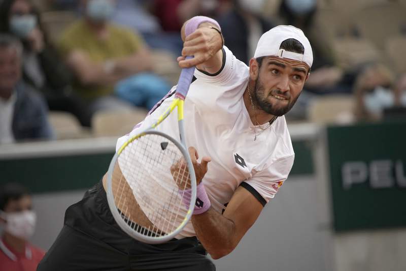 The Latest: Berrettini gives Italy 3 in French Open Week 2