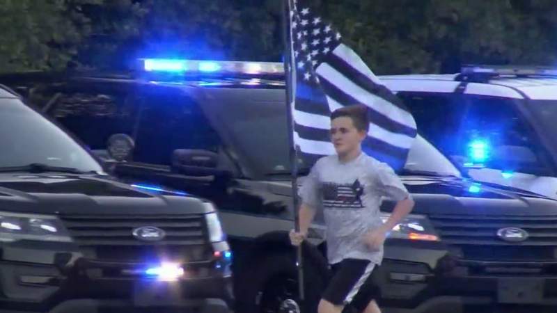 Winter Springs boy dedicates mile run to honor officer Jason Raynor