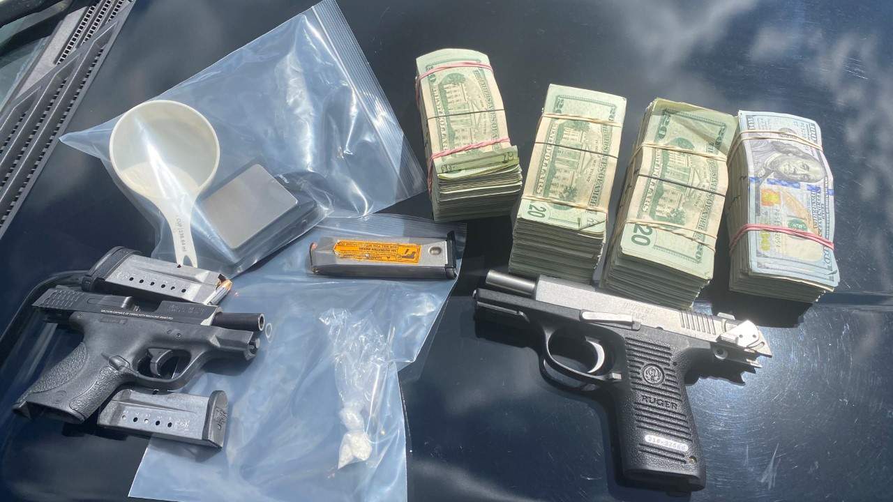 Stacks of cash, guns and drugs seized during Sumter County traffic stop