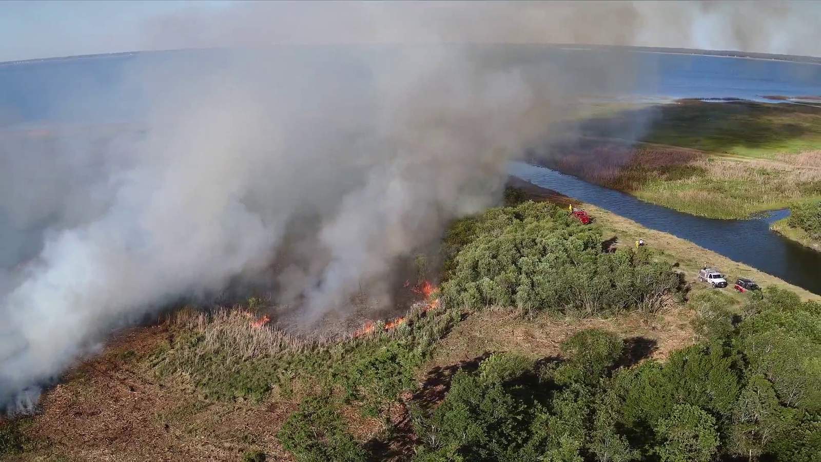 Drone video shows Osceola firefighters battling 20-acre brush fire