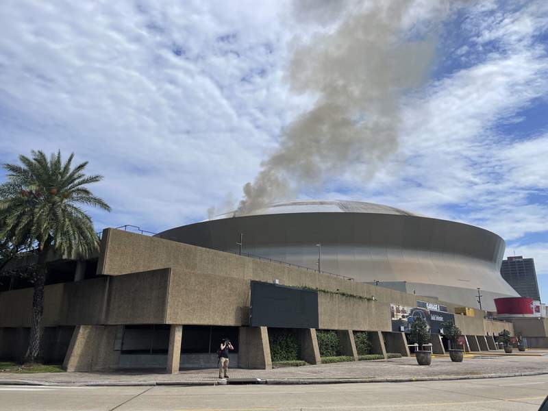 New Orleans: Flames shoot up side of Superdome roof, put out