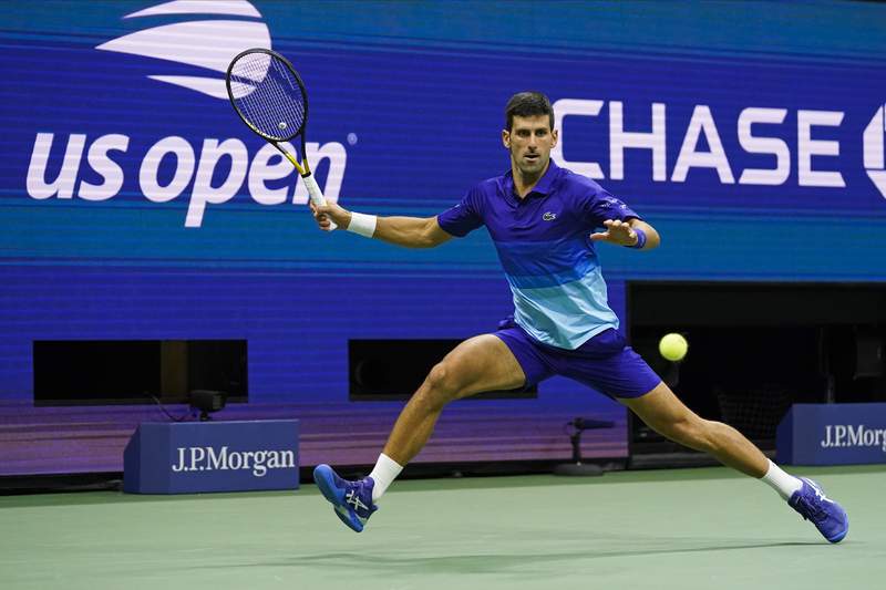 The Latest: Djokovic, Zverev going 5 in US Open semifinals