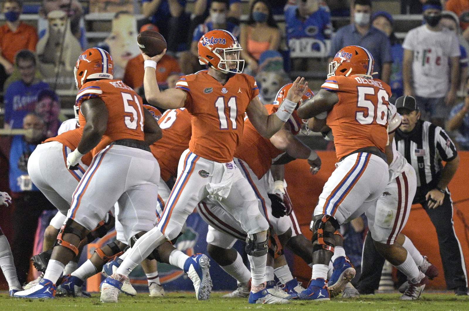 Florida quarterback Kyle Trask (11) throws a pass during the first half of an NCAA college football game, Saturday, Nov. 14, 2020, in Gainesville, Fla. (AP Photo/Phelan M. Ebenhack)