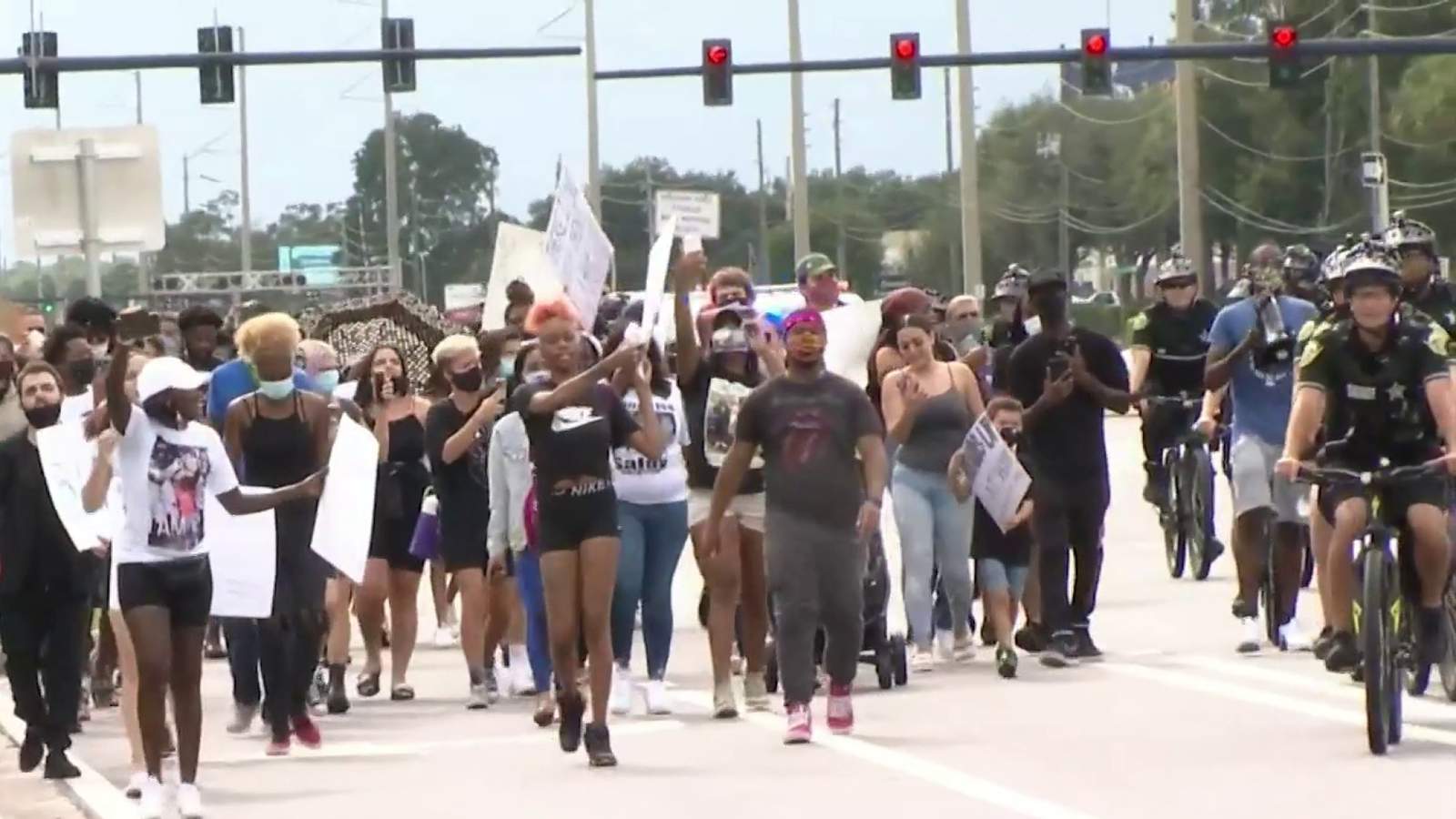Protesters march near Florida Mall where 22-year-old was fatally shot by deputy