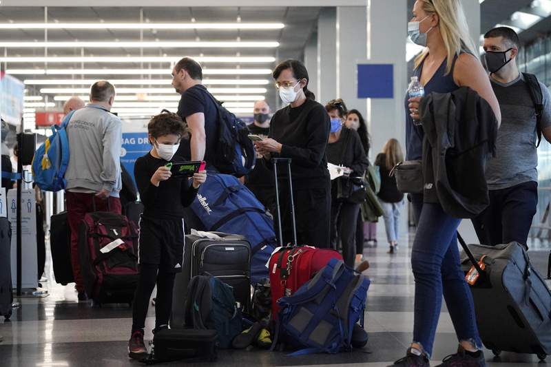 As air travel hits new pandemic high, flight delays grow