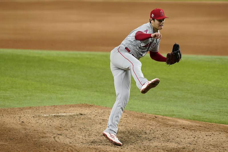 Solid Ohtani, speedy Lagares help Angels beat Rangers 2-1