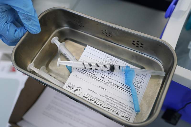 Cities, police unions clash as vaccine mandates take effect