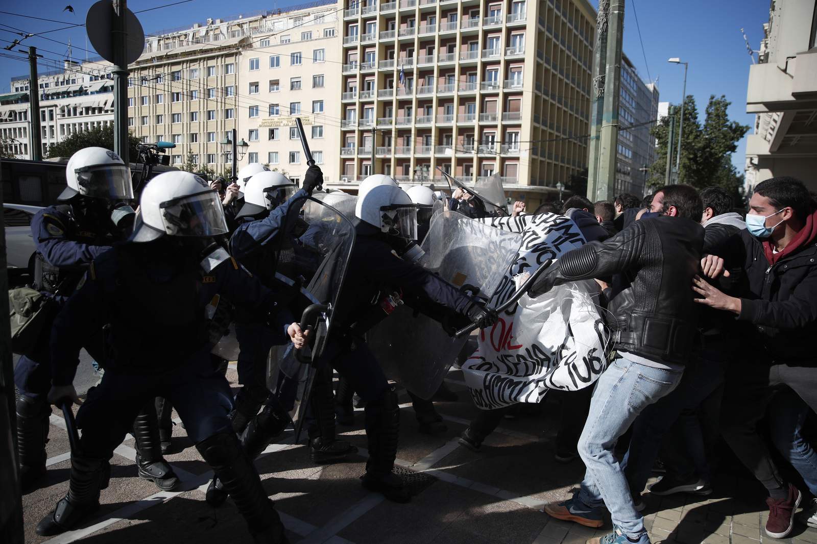 Greek police clash with protesters over campus police plan